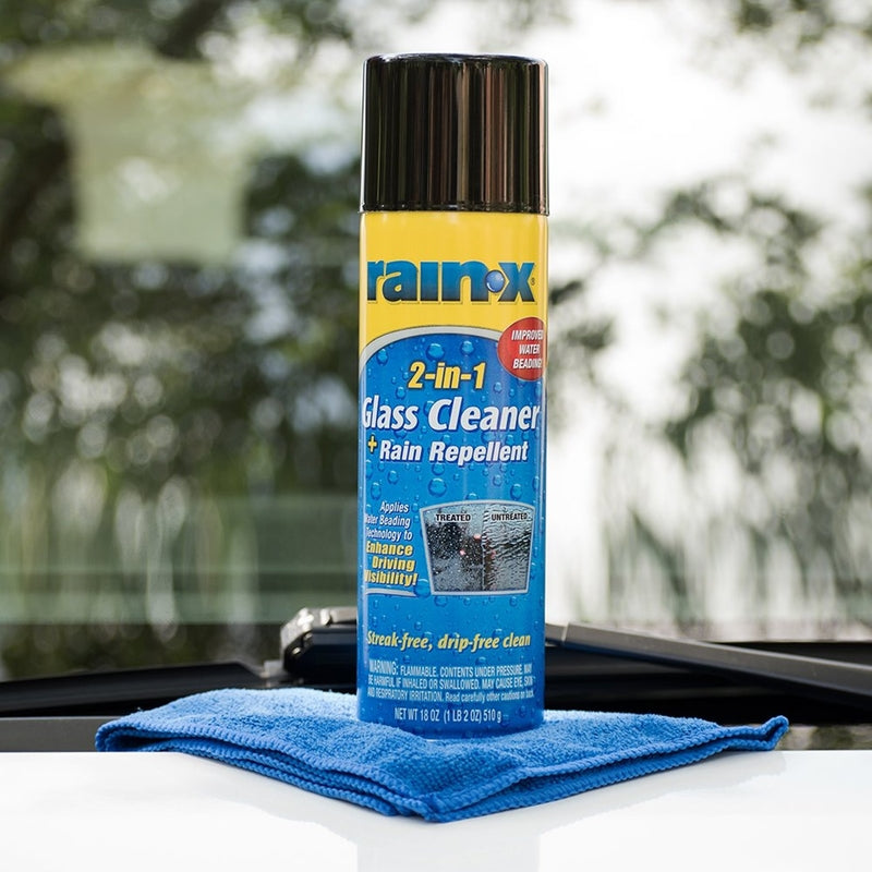 Rain-X Glass Cleaner & Rain Repellant Spray on top of a cloth.