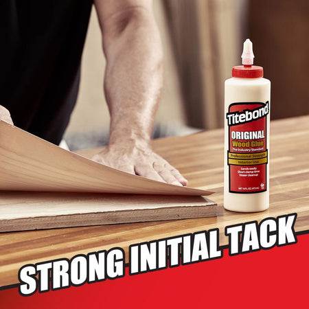Franklin Titebond Original Wood Glue being used to apply laminate to a piece of wood.