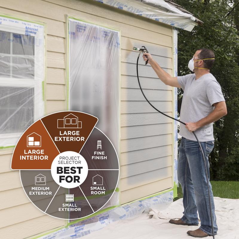 Man spraying exterior siding with the Wagner Control Pro 150 Metal Airless Paint Sprayer.