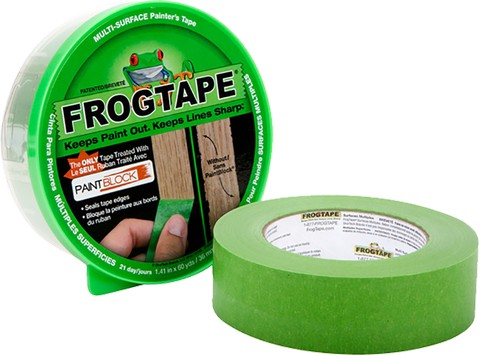 FrogTape roll shown next to the plastic container it comes in.