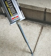 Rust-Oleum Concrete Saver Flexible Joint Sealant being applied to a gap in concrete.