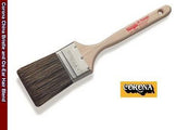 The image shows the Corona ST Thomas Ox-Ear Hair Paint Brush 4460 with its unlacquered hardwood peg handle and stainless-steel ferrule. Its bristles are carefully blended with China bristle and Ox-Ear hair, showcasing its premium quality and durability.