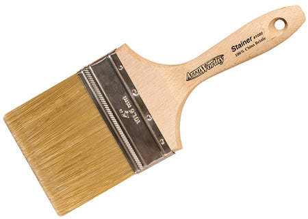 A high-resolution image showcasing the ArroWorthy 4" Oil Stainer Paint Brush White China Bristle 1080 in action, effortlessly gliding along a wooden surface with precision and ease.