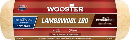 The image shows the Wooster Lambswool 100 Roller Cover. Its buff-colored lambswool is knitted into a synthetic backing, while the green double-thick polypropylene core is visible at the end of the roller cover.