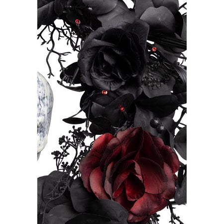 Gothic-style floral arrangement with black and red roses on a white background