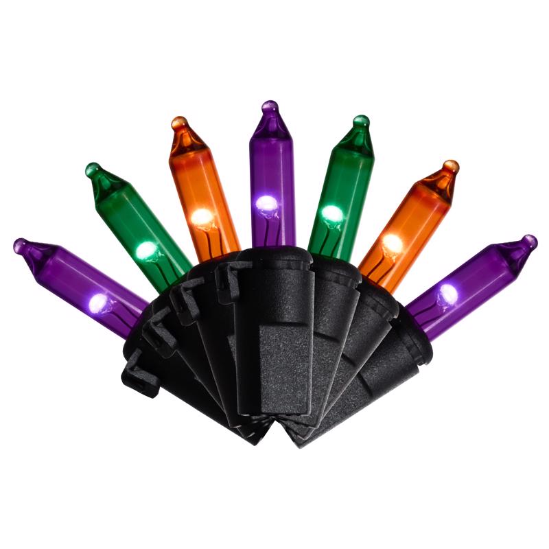 Set of colorful LED Halloween lights with black holders on a white background