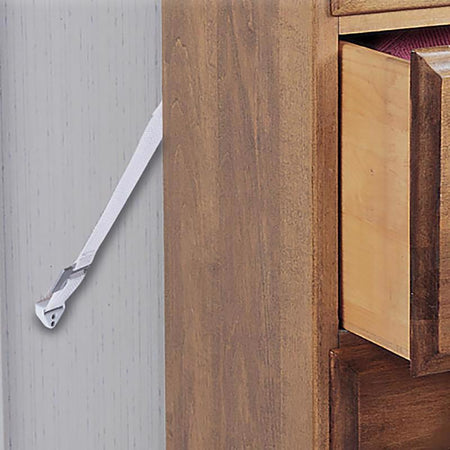 Wooden cabinet secured with Safety 1st Furniture Wall Straps 2-Pack 11014