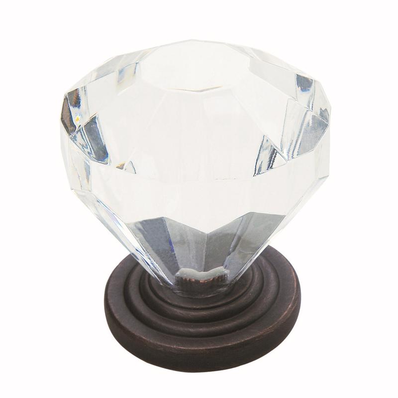 Clear crystal knob with bronze base on a white background