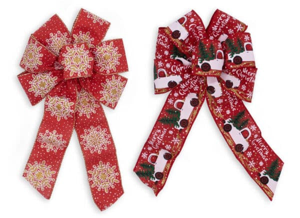 Two Christmas-themed ribbon bows on a white background. The bow on the left is red with white snowflakes and gold glitter trim.