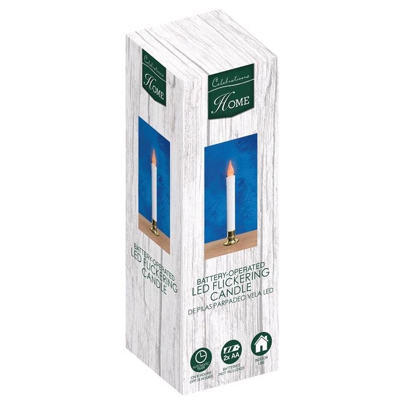 Packaged battery-operated LED flickering candle with 'Home' branding on a white background