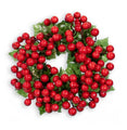 Christmas wreath with red berries on a white background