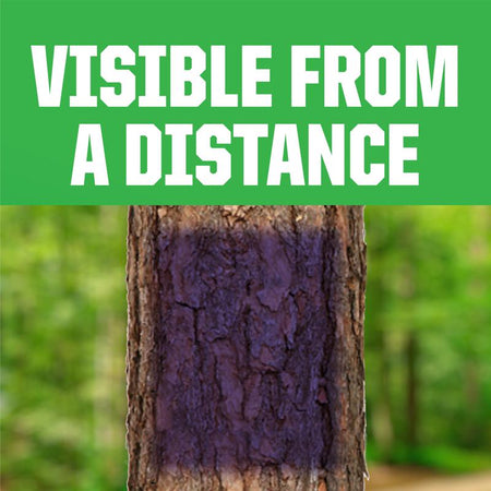 Tree trunk with a green background and text 'VISIBLE FROM A DISTANCE' in white.