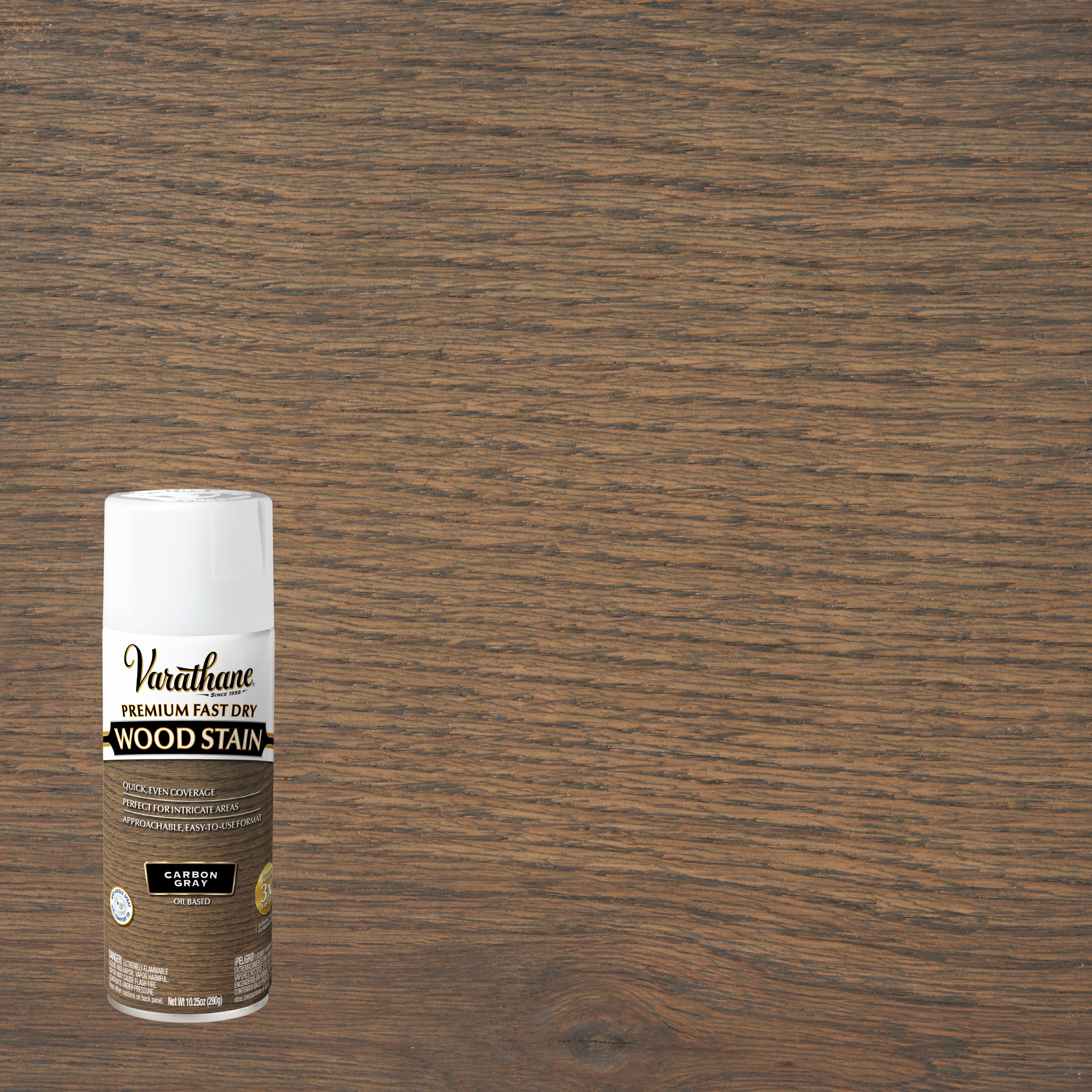 A can of Varathose Premium Fast-Dry Wood Stain in Carbon Gray is shown on the bottom left against a large brown wood-grain surface that demonstrates the stain color and finish.