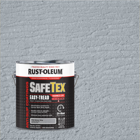 A can of Rust-Oleum Safetex Easy-Tread anti-slip coatings in Flat Armor Gray, shown in front of a textured gray painted brick wall background.