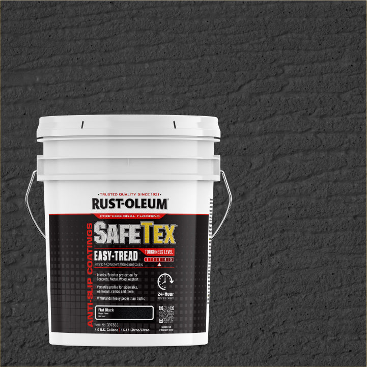 A white plastic bucket of Rust-Oleum SafeTex Easy-Tread, shown against a dark textured brick background.