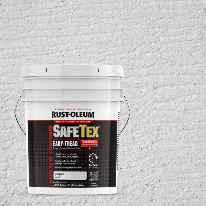 A white plastic bucket of Rust-Oleum SafeTex Easy-Tread Concrete Floor Coating, set against a textured white brick wall background.