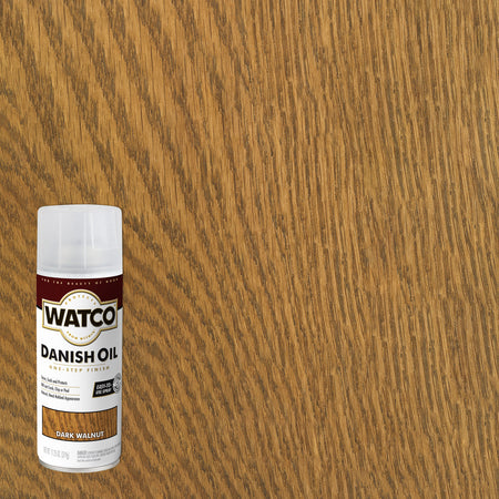 A can of Watco Danish Oil one-step finish in the Dark Walnut color, shown against a large background of the same walnut wood grain finish.