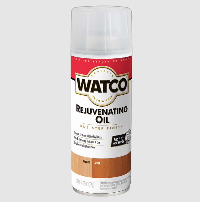 A can of Watco Rejuvenating Oil One-Step Finish spray on a light gray background. The can features a white label with a red top section, gold and black branding, and a brown 'Before' and 'After' wood finish comparison graphic at the bottom.
