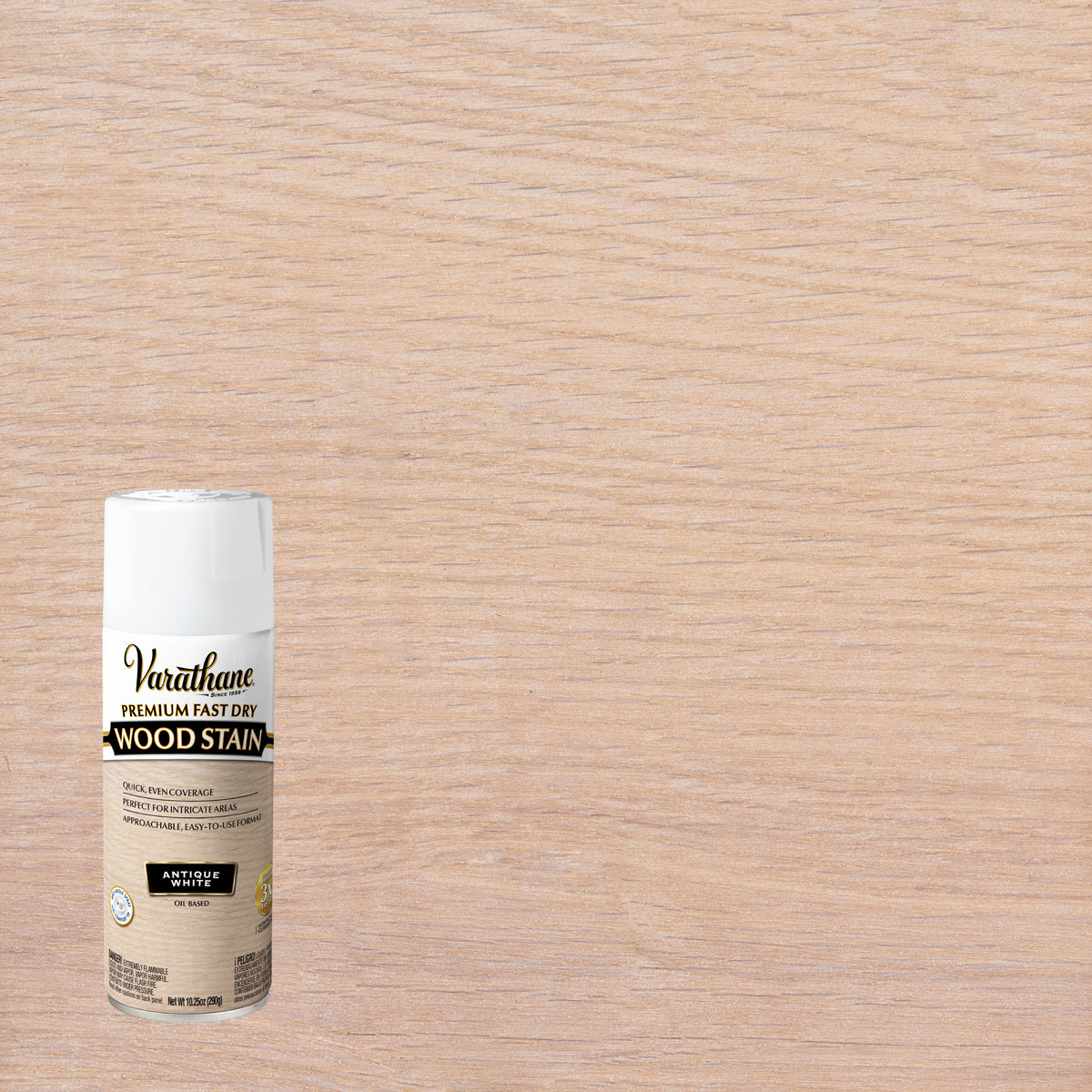 A can of Varathane Premium Fast Dry Wood Stain in Antique White finish, shown against a large wood grain surface that demonstrates the stain's effect.
