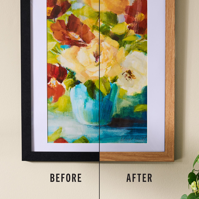 A framed floral painting shown side by side with a split before/after presentation. The left half shows the artwork inside a black frame with a white mat and the word BEFORE; the right half shows the same artwork in a natural wood frame with the word AFTER.