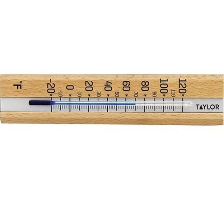 Wooden thermometer with metal scale on a white background, brand 'Taylor' visible