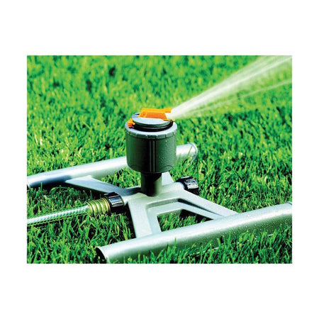 Whisper Quiet Sled Impulse Sprinkler 525054 watering grass on a white background