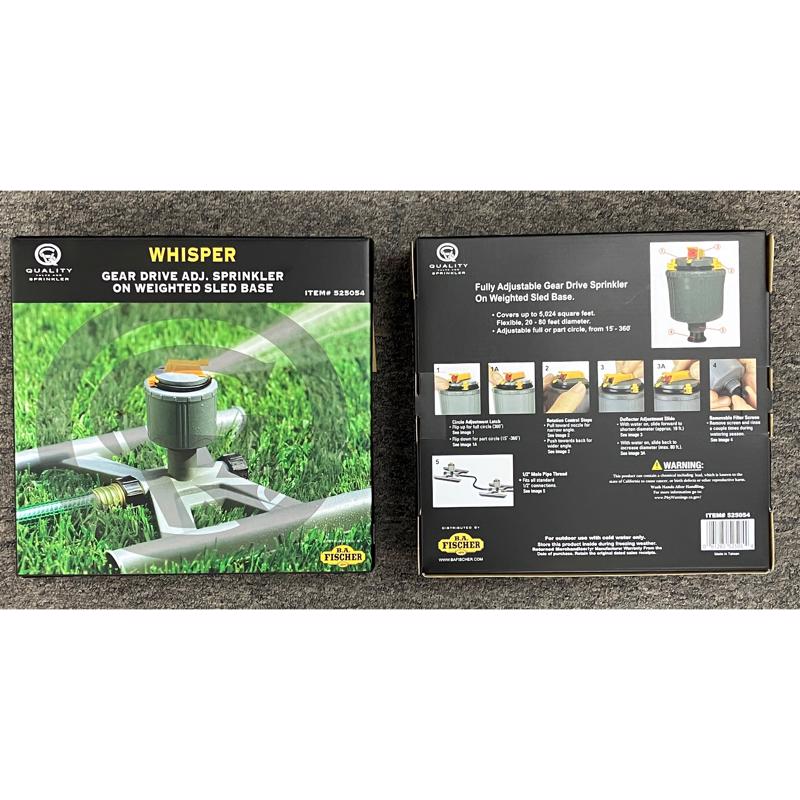 Whisper Quiet Sled Impulse Sprinkler 525054 box on a gray surface.