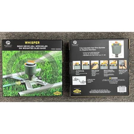 Whisper Quiet Sled Impulse Sprinkler 525054 box on a gray surface.