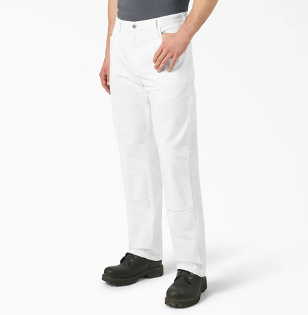 Front view of person wearing Dickies White Double Knee Relaxed Fit Painter's Pants with a plain background