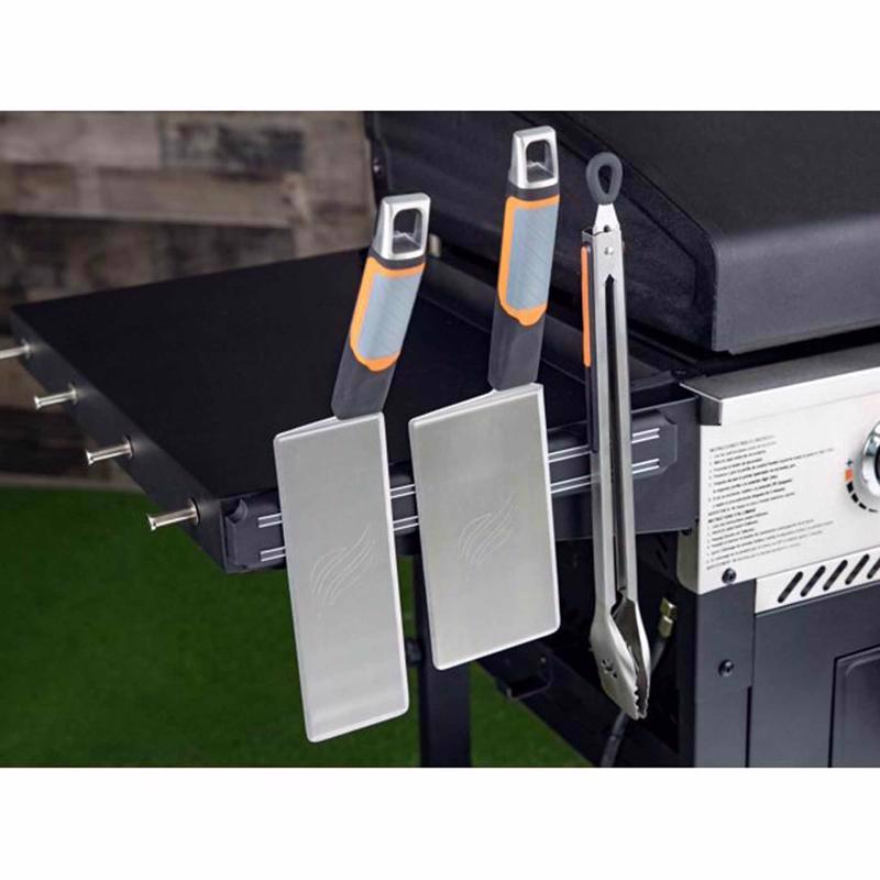 Blackstone 2 Burner Liquid Propane Outdoor Griddle 1962 left side holding utensils