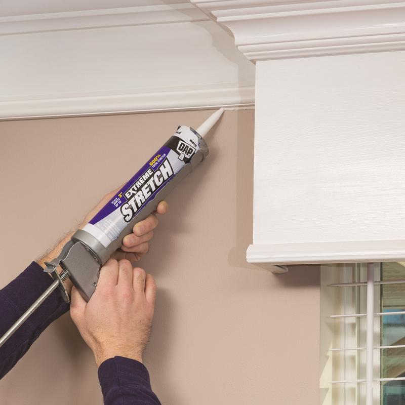 DAP 10.1 Oz Extreme Stretch Elastomeric Sealant being applied to crown molding.