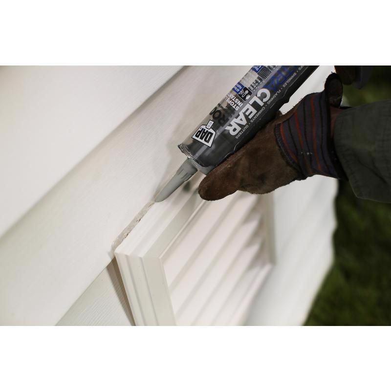 DAP Ultra Clear Roof Waterproof Rubberized Sealant being applied around a vent