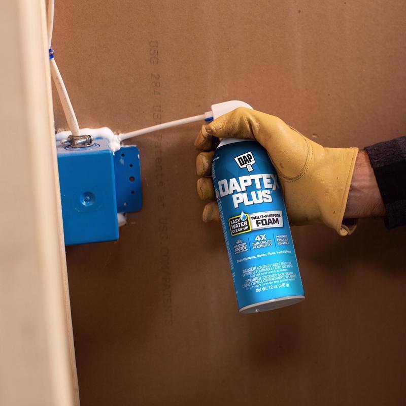 DAPtex Plus Window & Door Foam Sealant being applied around electrical box.