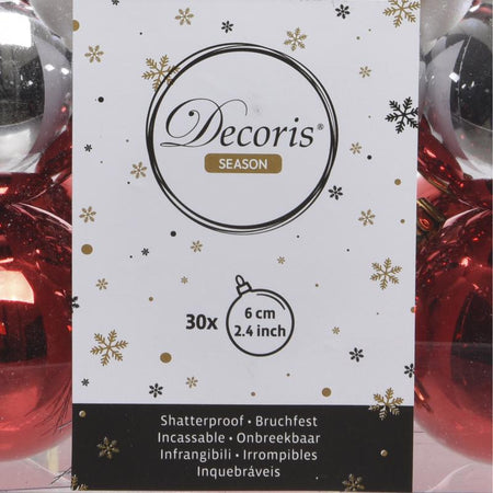 Decoris packaging with Christmas decorations in the background