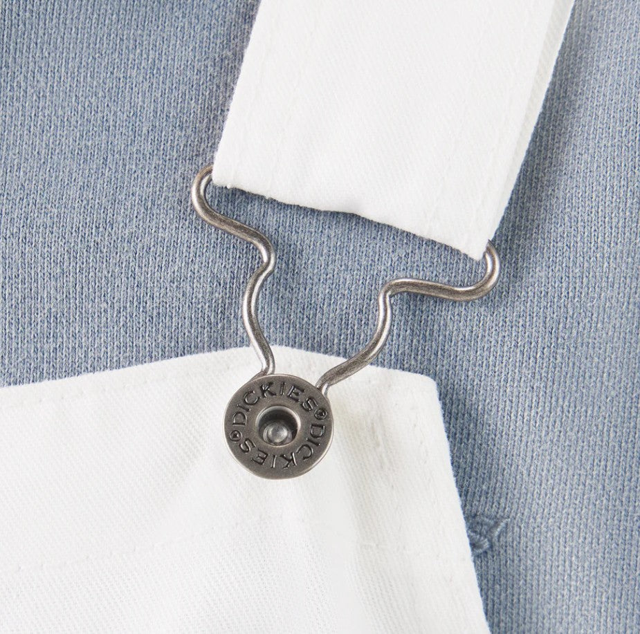 Dickies White Painter Bib Overalls Relaxed Fit hook on a blue fabric background