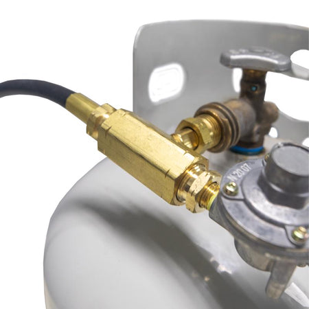 Close-up of a gas cylinder valve with a brass connector on a white background