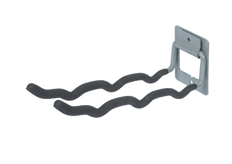 Metal wall bracket with wavy arm on a white background