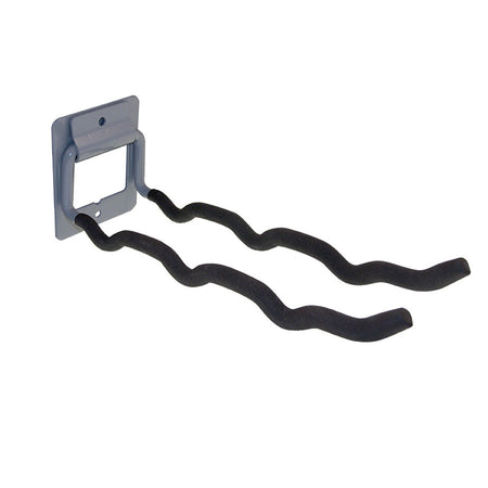 Wall-mounted tool holder with black metal hooks on a white background