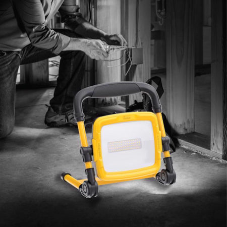 Feit Electric WORK3000XLPLUGFOLD Portable Work Light used inside of a home under construction.