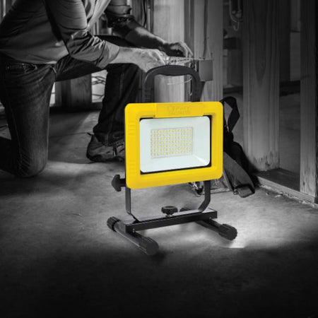 Feit Electric WORK2000XPLUG ProSeries Portable LED Work Light being used inside of a house under construction.