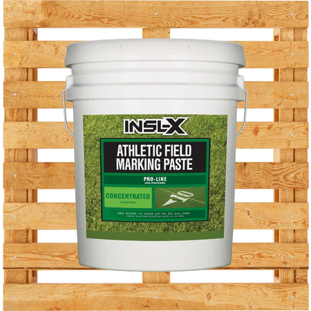 White bucket of INSL-X Athletic Field Marking Paste on a wooden pallet