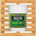 White bucket of INSL-X Athletic Field Marking Paste on a wooden pallet