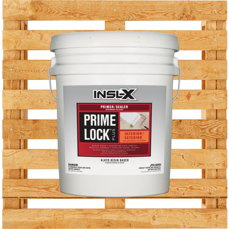 White bucket of INSL-X Prime Lock primer/sealer on a wooden pallet background