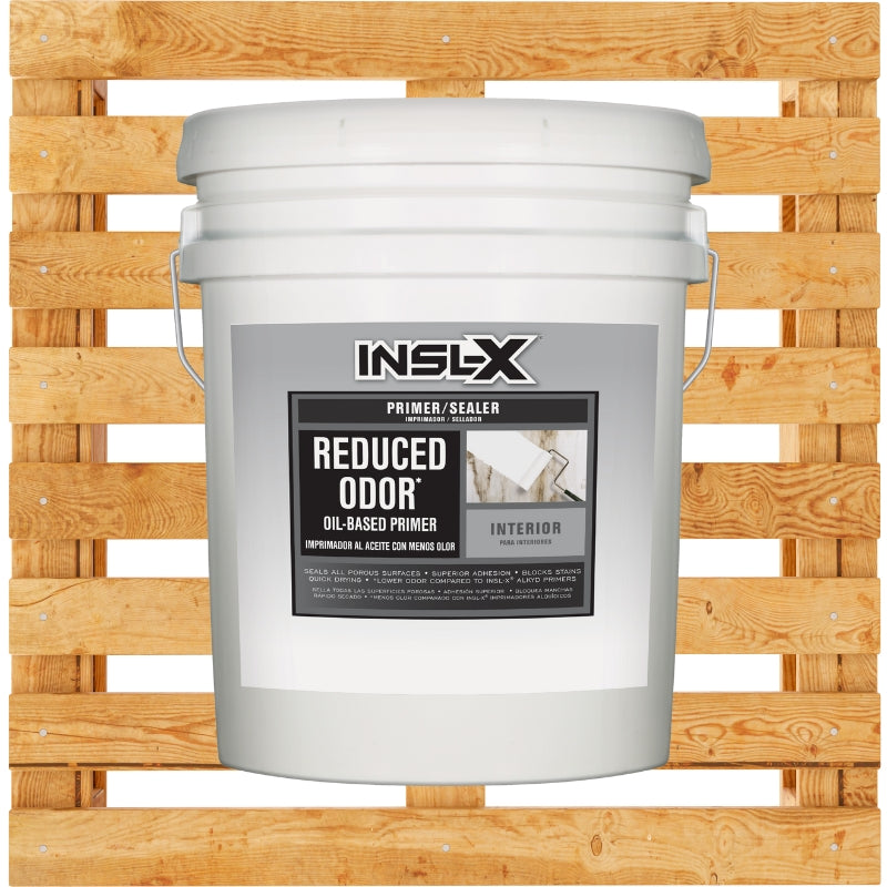 White bucket of INSL-X Reduced Odor Primer/Sealer on a wooden pallet background