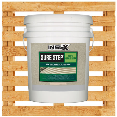 White 5 gallon bucket of INSL-X Sure Step acrylic anti-slip coating on a wooden pallet background