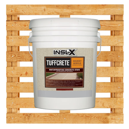 White bucket of INSL-X Tuffcrete waterproofing concrete stain on a wooden pallet