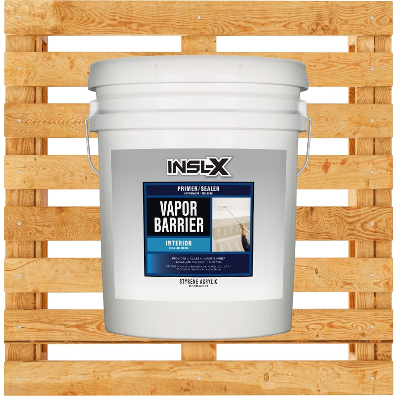 White bucket of INSL-X Vapor Barrier paint on a wooden pallet