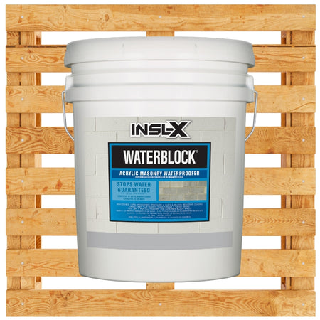 White 5 gallon bucket of INSL-X Waterblock on a wooden pallet