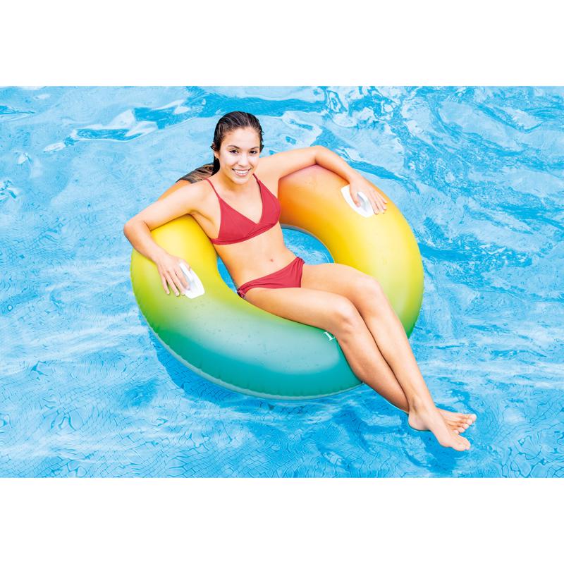 Girl floating on the Intex Multicolored Color Whirl Floating Tube 58202EP