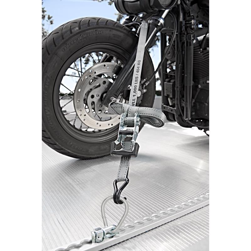 Keeper 1 in. W X 12 ft. L Gray High Tension Ratchet Tie-Down being used to strap down a motorcycle.